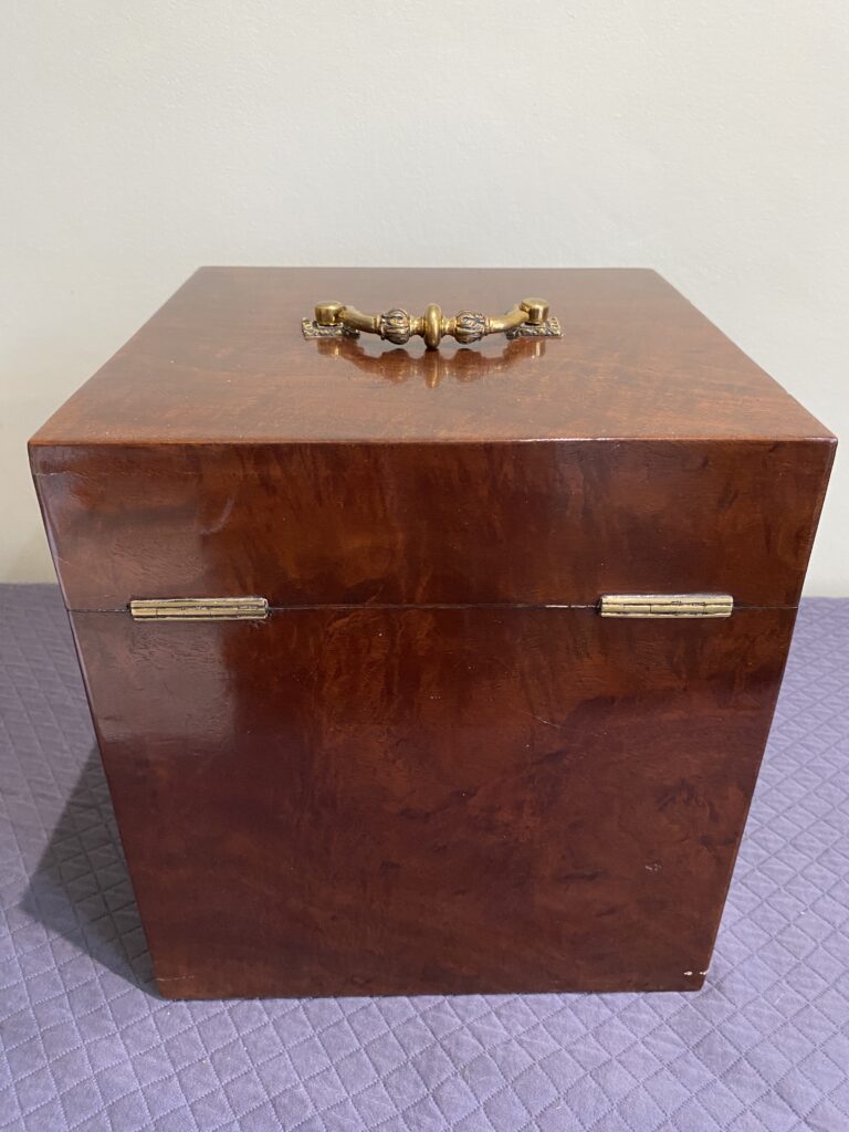 Georgian mahogany box with lined interior and fine quality cast brass carrying handle.