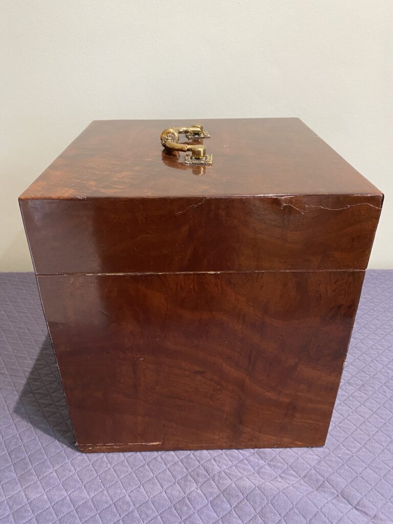 Georgian mahogany box with lined interior and fine quality cast brass carrying handle.